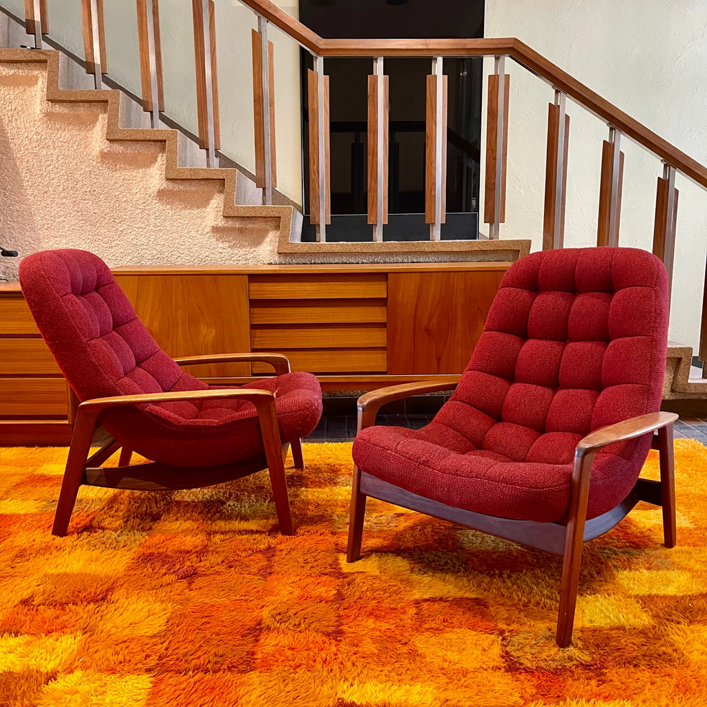 Pair of R. Huber scoop lounge chairs with teak frames and original upholstery