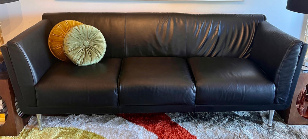 Black leather upholstery on Mark Goetz Herman Miller sofa