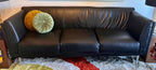 Black leather upholstery on Mark Goetz Herman Miller sofa