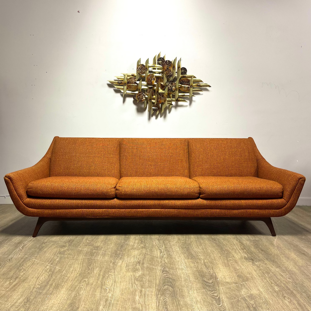 House of Braemore atomic style sofa with original burnt orange fabric and wooden base