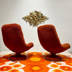 Back view of R. Huber swivel scoop lounge chairs
