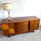 VISCOL nine drawer walnut dresser and credenza with sculptural legs