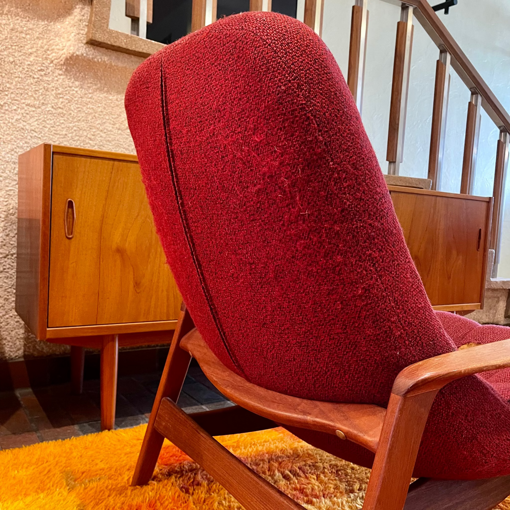 Back view of R. Huber scoop lounge chair with original upholstery