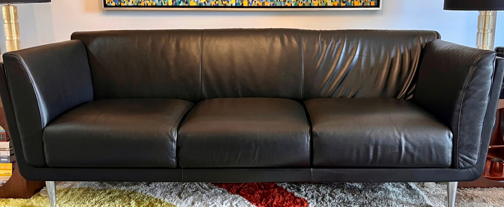 front view of black leather upholstery on Mark Goetz Herman Miller sofa