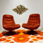 Pair of R. Huber swivel scoop chairs with original upholstery
