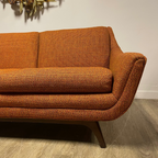 Arm rest detail on vintage House of Braemore atomic sofa