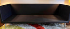 Mark Goetz walnut wrapped sofa for Herman Miller with black leather upholstery removed