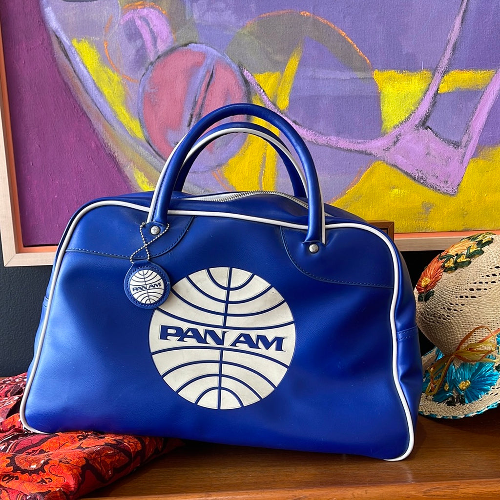 Vintage blue PAN AM carry-on travel bag with original label