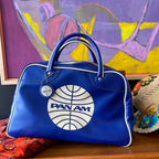 Vintage blue PAN AM carry-on travel bag with original label