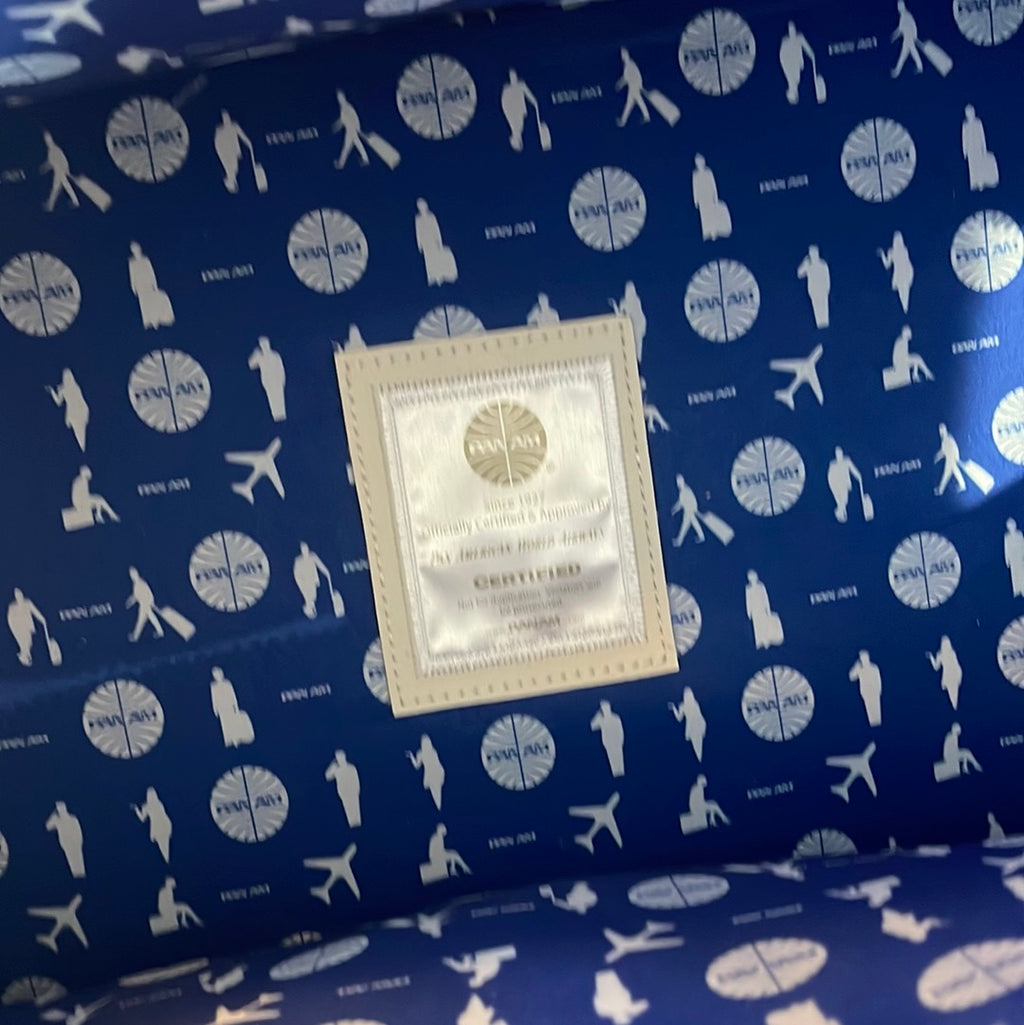 Close-up of original authentication label on vintage PAN AM travel bag